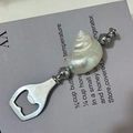 Natural conch shell handle bottle opener with polished silver metal finish - Moonlight Shell Bottle Opener