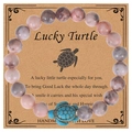 Bracelet perles en pierre naturelle rose avec pendentif tortue bleue sur carte - Pierre Zèbre Rose