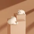 Pack d'un protège-coin de sécurité bébé en silicone ours blanc pour meubles - Ours Allongé Abricot