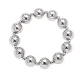 Pulsera de cuentas plateadas pulidas con bolas lisas sobre un fondo blanco minimalista - B-Cuentas de Color Plata Pura