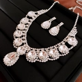 Elegant silver jewelry set with pear-shaped rhinestones including necklace and earrings - Silver Teardrop Rhinestone Style