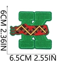 Detail of green embroidered letter K patch with Christmas patterns and dimensions - Christmas Letter-K