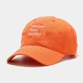 Detailed embroidery of white letters on an orange cotton baseball cap with curved brim - M (56-58cm) / Orange