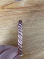 Close-up of adjustable copper magnetic therapy bracelet with twisted metal texture - Copper