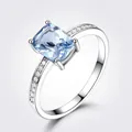 Classic 925 sterling silver ring featuring a rectangular light blue gemstone and side diamonds - Size 5 / Rectangular Halo Style (RUJ080B-1) / Light Blue