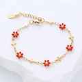 Pulsera de acero inoxidable dorado con flores de esmalte rojo y dijes de cruz pequeña - Flor Roja