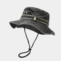 Detailed close-up of vintage washed denim bucket hat with embroidery and windproof cord - Black (Washed Black)