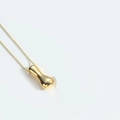 Golden liquid metal necklace with organic streamlined curved pendant and fine chain - Letter I