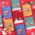 Detail of colorful Christmas spiral notebooks with cartoon patterns and Merry Christmas text - Christmas Spiral Notebook 1pc