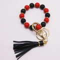 Silikon-Perlen-Schlüsselanhänger in Rot und Schwarz mit goldenen Strass-Zwischenstücken - Rot-schwarze Perlen/Schwarze Quaste