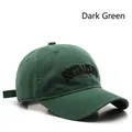 Berretto da baseball in cotone verde scuro con ricamo Social Club nero e cinturino - Verde Scuro