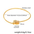 Bracciale rigido in acciaio inossidabile placcato oro 18k con stella marina e zirconi - Bracciale Pesce Dorato con Zircone 5A (Z441)
