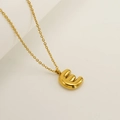 Polished golden stainless steel bubble letter E pendant necklace on white background - Letter E / Gold