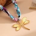 Gold plated dragonfly pendant necklace featuring colorful silk ribbon and textured metal - Scarf Dragonfly Necklace (Random Scarf Color) (K806)