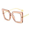 Fashionable oversized square glasses featuring amber translucent frames and gold metal temples - Champagne Frame Transparent Lenses