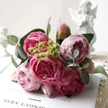 Close-up of pink artificial peonies and silk roses with realistic green leaves and stems - Rose Pink