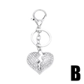 Portachiavi con cuore spezzato di cristallo scintillante in lega d'argento con chiusura - Stile cuore spezzato