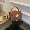 Chic brown contrast flap handbag with stylish golden pebble buckle and shoulder strap - Brown