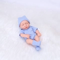 20cm reborn baby doll in blue striped sleepwear and hat on white faux fur background - Blue Striped Style