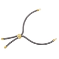 Macro detail of adjustable woven bracelet with gold Tree of Life metal slider bead - Gray