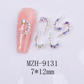 Macro detail of 7x12mm heart shaped iridescent rhinestones for nail art decoration - Heart Style (MZH-9131)