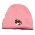 Pink knitted beanie hat with frog sitting on a mushroom embroidery detail - One Size / Pink