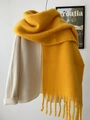 Thick ginger yellow mohair scarf with tassels paired with an off-white coat - Lemon Yellow