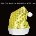 Detail of adult gold sequin Christmas hat with white plush trim and fluffy top ball - Adult Yellow Sequins Hat