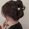 Matte black large shark hair claw clip with golden metal seal for elegant updo hairstyles - Elegant Square Label Black