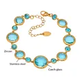 Bohemian gold stainless steel bracelet with light blue Czech glass and blue zircon stones - Gold Blue