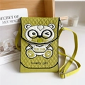 Detailed knit texture of green panda crossbody bag with adjustable fabric strap - Glasses Bear Yellow