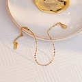 Elegant 18K gold starburst chain bracelet with K18 hallmark and lobster clasp - Thin Sparkling Chain Bracelet