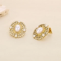 Detail of vintage gold earrings featuring center pearls and sparkling crystal halo - Gold Vintage Pearl Rhinestone Style (KE116345-KFC)