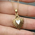 Golden heart pendant necklace featuring natural shell inlay and sunburst ray design - 18K Gold Plated Copper + Mother of Pearl / Gold