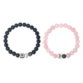 Macro view of sun and moon engraved metal beads on matching couple beaded bracelets - Couple Pair Set / Luminous-Matte Black & Pink Quartz