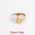 Minimalist open ring in golden stainless steel featuring a white oval natural stone inlay - Style 13-Asymmetric White Oval
