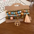 Detail of Bohemian multilayer sandalwood beads with Tree of Life charm and pink tassel - Pink