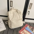 Minimalist corduroy backpack for women in cream white finish with front zipper pocket - Off White