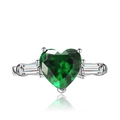 Three-stone ring featuring a heart-cut emerald green gemstone and baguette side diamonds - Adjustable Open / Green Zirconia