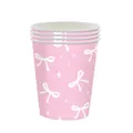 Dettaglio di bicchieri di carta rosa con fiocchi bianchi e stelle per decorazione festa - Bicchieri di Carta Rosa