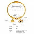 Detailed size guide of gold titanium steel bangle with evil eye charms and crystals - Gold (Z264)