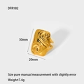 Detailed macro view of gold-plated stainless steel ring with spiral embossed texture - Vortex Relief (DFR182)