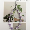 Cinturino per telefono con farfalle colorate e perle su sfondo floreale decorativo - Farfalla Viola