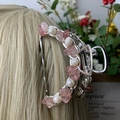 Silver metal hair claw with pink irregular stones and pearls on blonde hair - Strawberry Quartz Deep Sea Pearl Silver Hair Claw