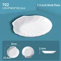 White shell-shaped melamine dipping dish with size dimensions for restaurant use - 7.5 Inch Shell Plate