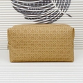 Beige woven texture toiletry bag with zipper closure for travel and cosmetic storage - Camel