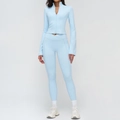 Light blue yoga set featuring a stand collar zip-up top and high waist pocket leggings - S / Top And Bottom (Jacket & Leggings) / Water Blue