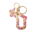 Resin letter U keychain with pink heart sequins, golden butterfly and leather tassel - Letter U