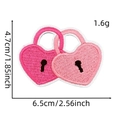 Detail view of interlocking pink embroidered heart patches with size and weight dimensions - Style 23 (Interlocking Hearts)