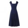 Detailed view of the square neck sleeveless bodice and pleated A-line hem of the navy dress - XS / Dark Blue